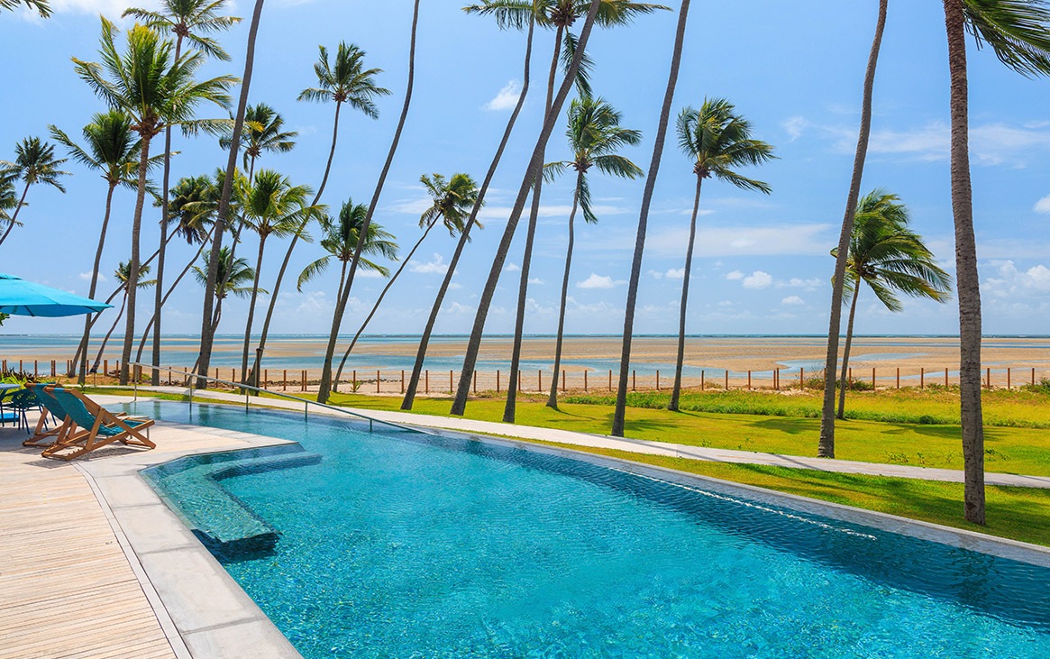 Vista praia a partir das piscinas das casas